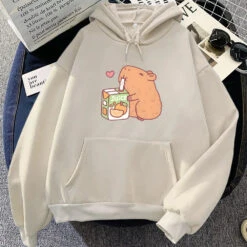 Apparel Capybara Drinking Orange Juice Unisex Hoodie 21 Apparel Capybara Drinking Orange Juice Unisex Hoodie -Kawaii Store kawaiies plushies plush softtoy capybara drinking orange juice unisex hoodie apparel cream l 785566
