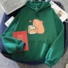 Apparel Capybara Drinking Orange Juice Unisex Hoodie 1 Apparel Capybara Drinking Orange Juice Unisex Hoodie -Kawaii Store kawaiies plushies plush softtoy capybara drinking orange juice unisex hoodie apparel dark green xl 479378