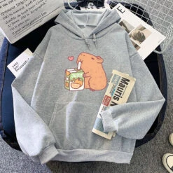 Apparel Capybara Drinking Orange Juice Unisex Hoodie 28 Apparel Capybara Drinking Orange Juice Unisex Hoodie -Kawaii Store kawaiies plushies plush softtoy capybara drinking orange juice unisex hoodie apparel gray xl 673784