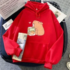 Apparel Capybara Drinking Orange Juice Unisex Hoodie 26 Apparel Capybara Drinking Orange Juice Unisex Hoodie -Kawaii Store kawaiies plushies plush softtoy capybara drinking orange juice unisex hoodie apparel red xxxl 668194