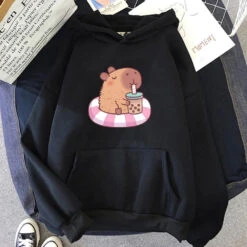 Apparel Capybara Floating & Sipping Bubble Tea Unisex Hoodie -Kawaii Store kawaiies plushies plush softtoy capybara floating sipping bubble tea unisex hoodie apparel black xs 948263