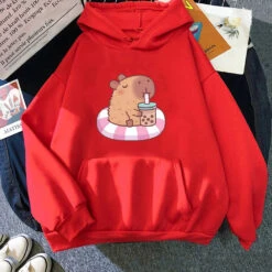 Apparel Capybara Floating & Sipping Bubble Tea Unisex Hoodie -Kawaii Store kawaiies plushies plush softtoy capybara floating sipping bubble tea unisex hoodie apparel red xs 654783