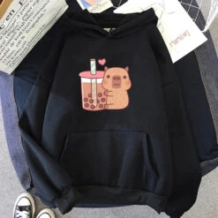 Apparel Capybara Hugging Drinking Bubble Tea Unisex Hoodie -Kawaii Store kawaiies plushies plush softtoy capybara hugging drinking bubble tea unisex hoodie apparel black xs 632890
