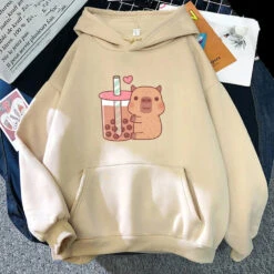 Apparel Capybara Hugging Drinking Bubble Tea Unisex Hoodie -Kawaii Store kawaiies plushies plush softtoy capybara hugging drinking bubble tea unisex hoodie apparel cream xs 985712