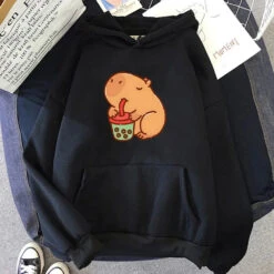 Apparel Chonky Capybara Drinking Matcha Bubble Tea Unisex Hoodie -Kawaii Store kawaiies plushies plush softtoy chonky capybara drinking matcha bubble tea unisex hoodie apparel black xs 988513