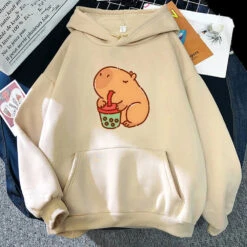 Apparel Chonky Capybara Drinking Matcha Bubble Tea Unisex Hoodie -Kawaii Store kawaiies plushies plush softtoy chonky capybara drinking matcha bubble tea unisex hoodie apparel cream xs 461416