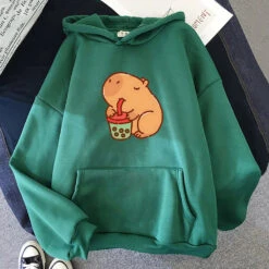 Apparel Chonky Capybara Drinking Matcha Bubble Tea Unisex Hoodie -Kawaii Store kawaiies plushies plush softtoy chonky capybara drinking matcha bubble tea unisex hoodie apparel green xs 960404