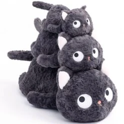 Jiji The Fluffy Black Cat Plushie Laying Down
