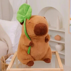 Kawaii Capybara Plushie Holding Leaf 25 Kawaii Capybara Plushie Holding Leaf -Kawaii Store kawaiies plushies plush softtoy kawaii capybara plushie holding leaf soft toy 30cm 503445