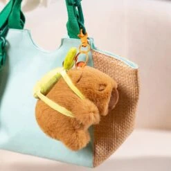 The Kawaii Capybara With Mini Avocado Backpack Plushie -Kawaii Store kawaiies plushies plush softtoy the kawaii capybara with mini avocado backpack plushie soft toy 12cm pendent 576740