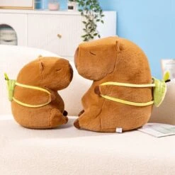 The Kawaii Capybara With Mini Avocado Backpack Plushie -Kawaii Store kawaiies plushies plush softtoy the kawaii capybara with mini avocado backpack plushie soft toy 265085