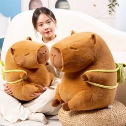 The Kawaii Capybara With Mini Avocado Backpack Plushie -Kawaii Store kawaiies plushies plush softtoy the kawaii capybara with mini avocado backpack plushie soft toy 587079