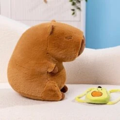 The Kawaii Capybara With Mini Avocado Backpack Plushie -Kawaii Store kawaiies plushies plush softtoy the kawaii capybara with mini avocado backpack plushie soft toy 992923