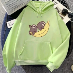 Apparel Two Baby Sloths Hugging Banana Unisex Hoodie -Kawaii Store kawaiies plushies plush softtoy two baby sloths hugging banana unisex hoodie apparel light green s 836046